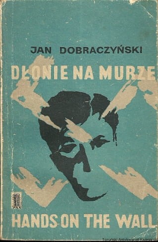 dlonie na murze PAX.jpg